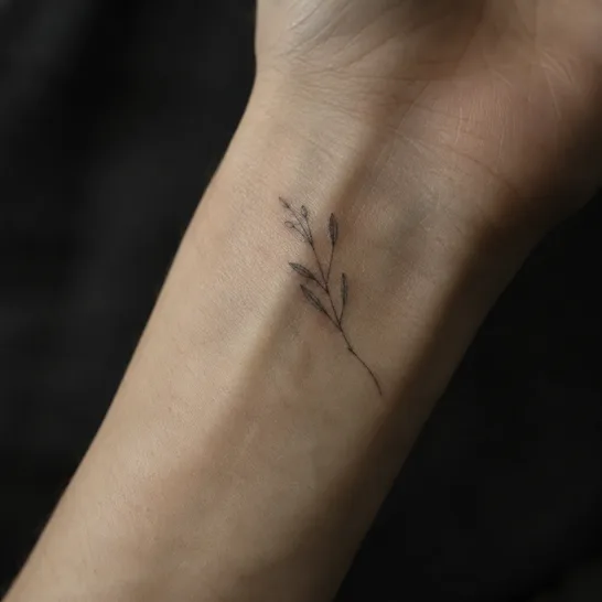 Close-up of healed fine-line work on the inside of a wrist